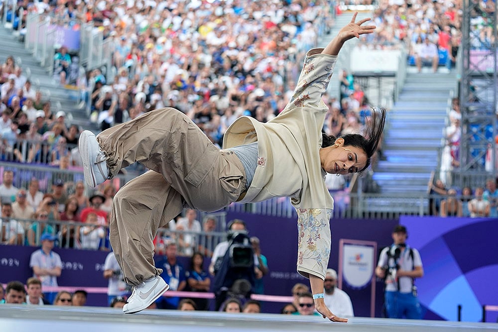 | Photo: AP/Frank Franklin : B-Girl Elmamouny, competes in breaking competition